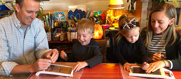 family enjoying creating art together